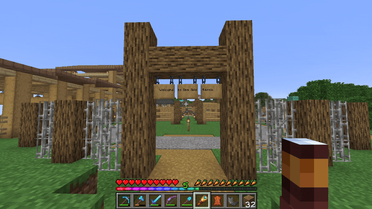 A couple shots of the Sea Side Ranch, including the sign, stables, and track.